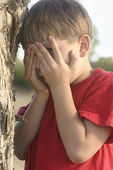 covering the eyes; click for the article