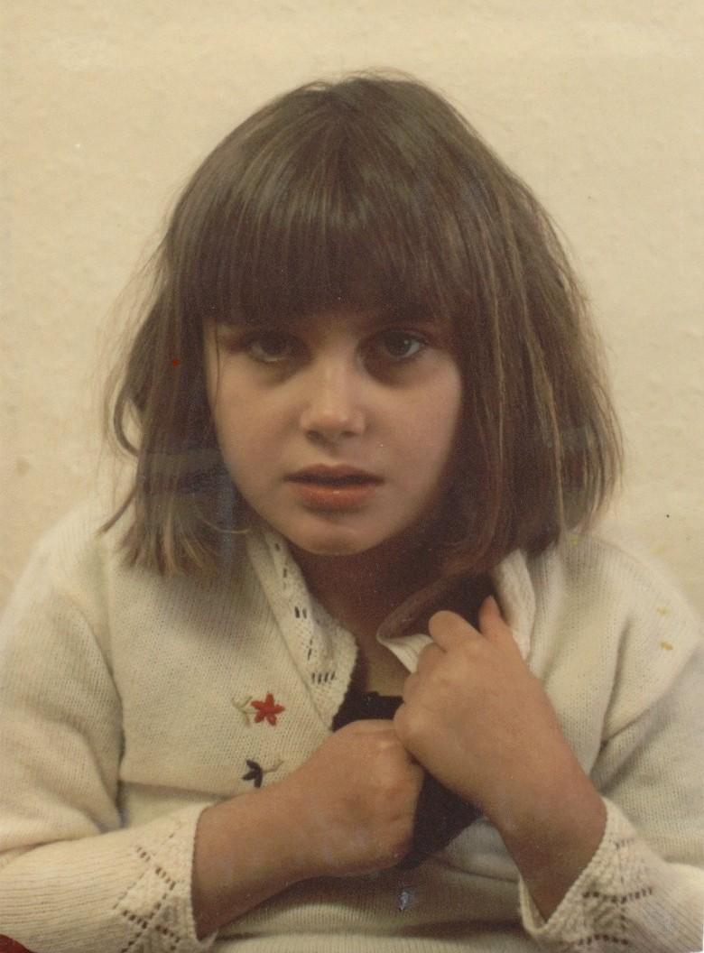 jenna, photo of a severely mentally handicapped young girl looking very intense